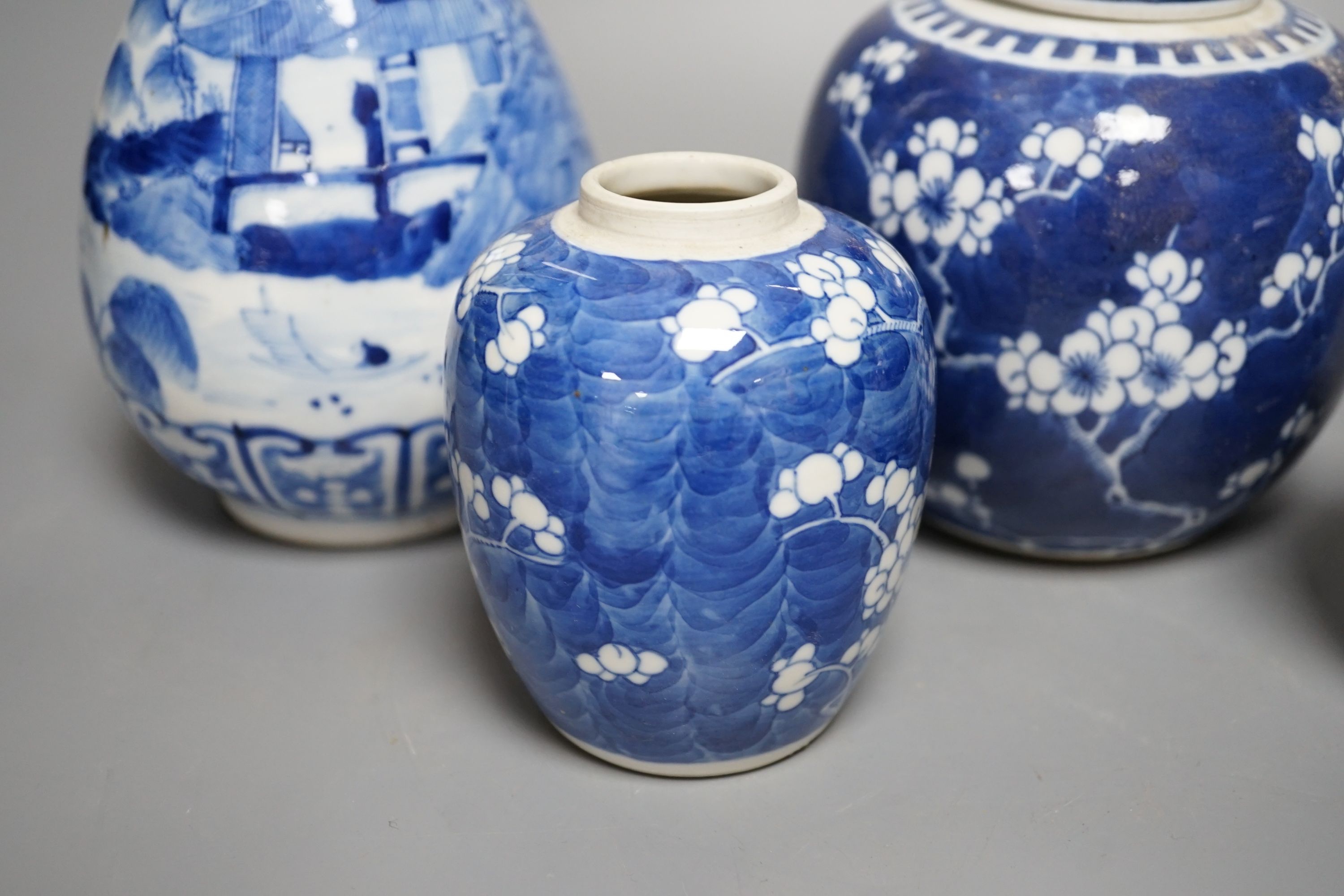 A Chinese blue and white vase and 3 graduated blue and white ginger jars, Vase25 cms high.